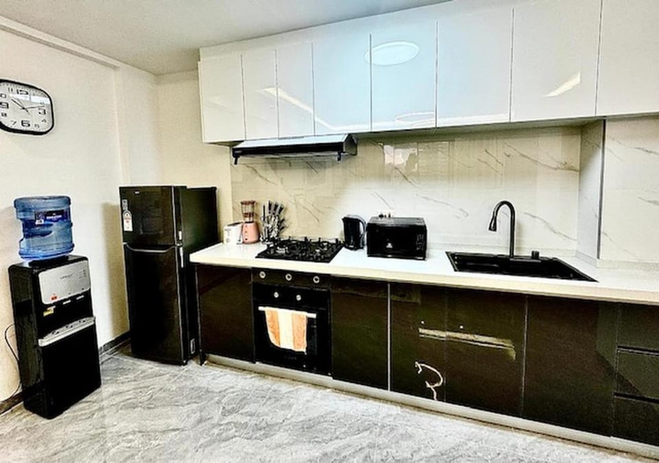 Kitchen or kitchenette, oven, stove, toaster