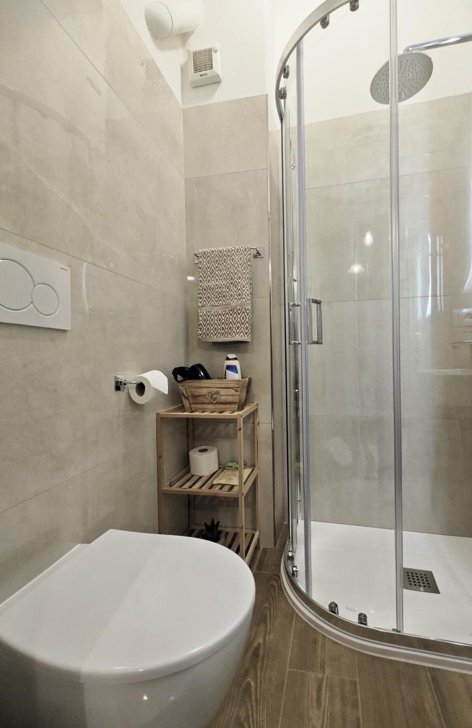 Shower, Toilet, Bathroom, hair dryier, towels