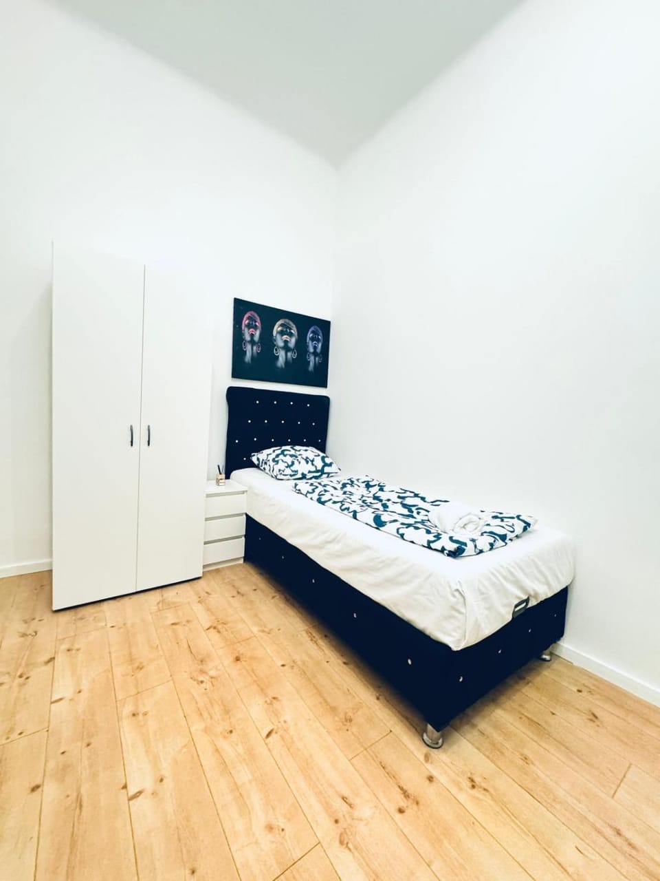 Bed, wardrobe