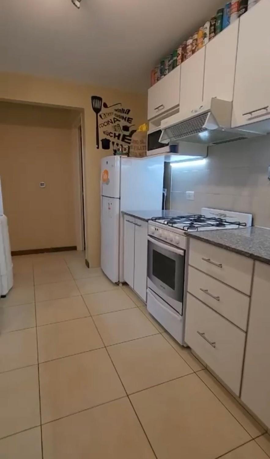 Kitchen or kitchenette, oven