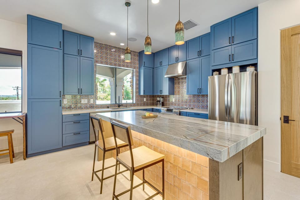 Kitchen or kitchenette, dishwasher, oven, stove