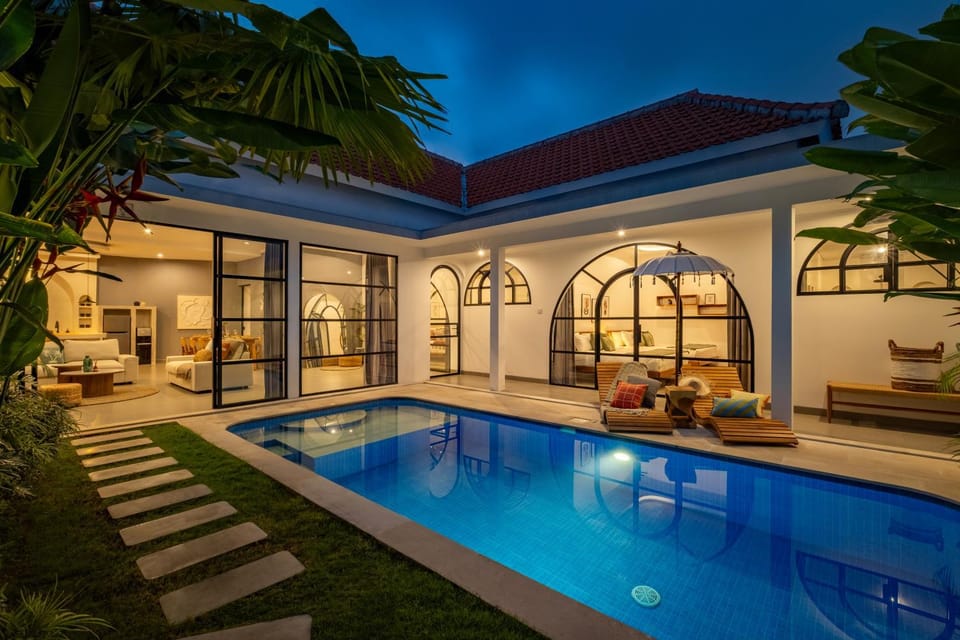 Property building, Patio, Night, Pool view, Swimming pool, sunbed