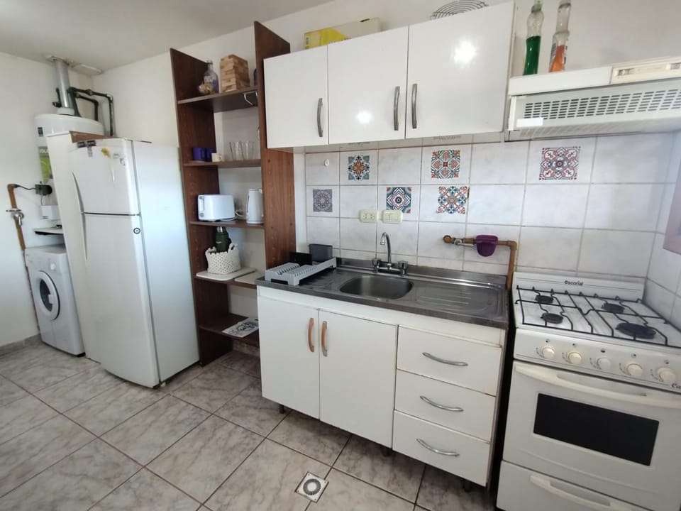 Kitchen or kitchenette, oven, toaster
