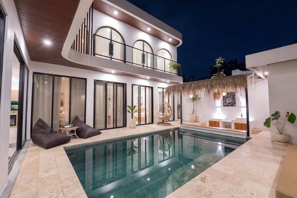 Property building, Patio, Night, BBQ facilities, Pool view, Swimming pool, sunbed