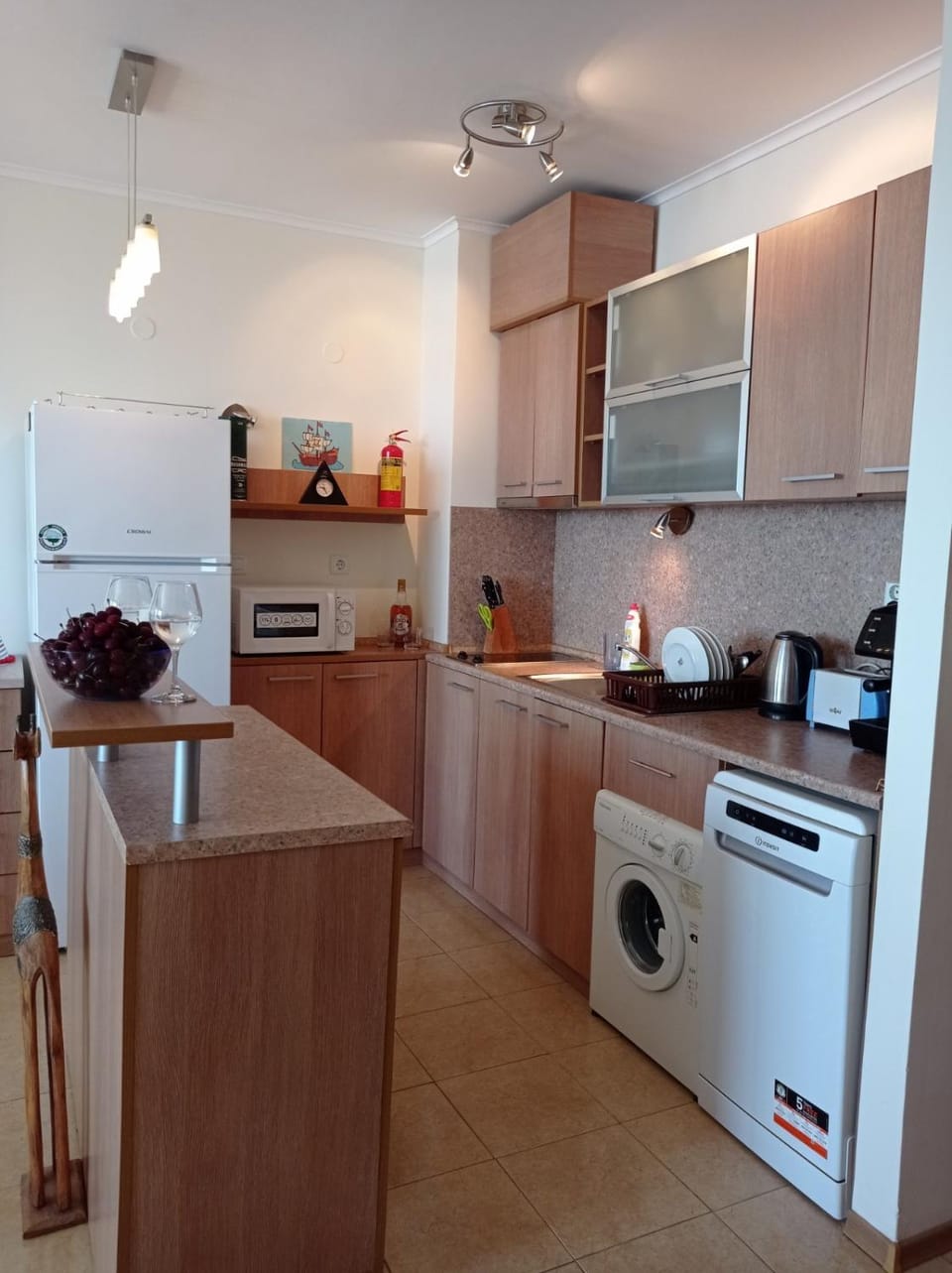 Kitchen or kitchenette, washing machine