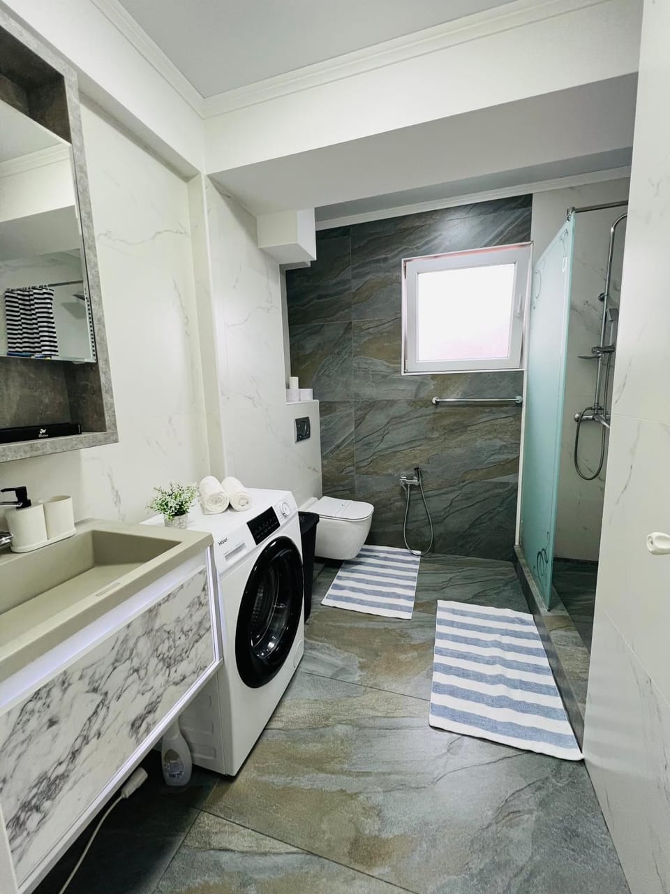 Bathroom, towels, washing machine