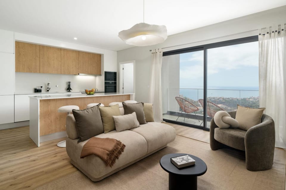 Kitchen or kitchenette, Living room, Seating area, Dining area, Sea view