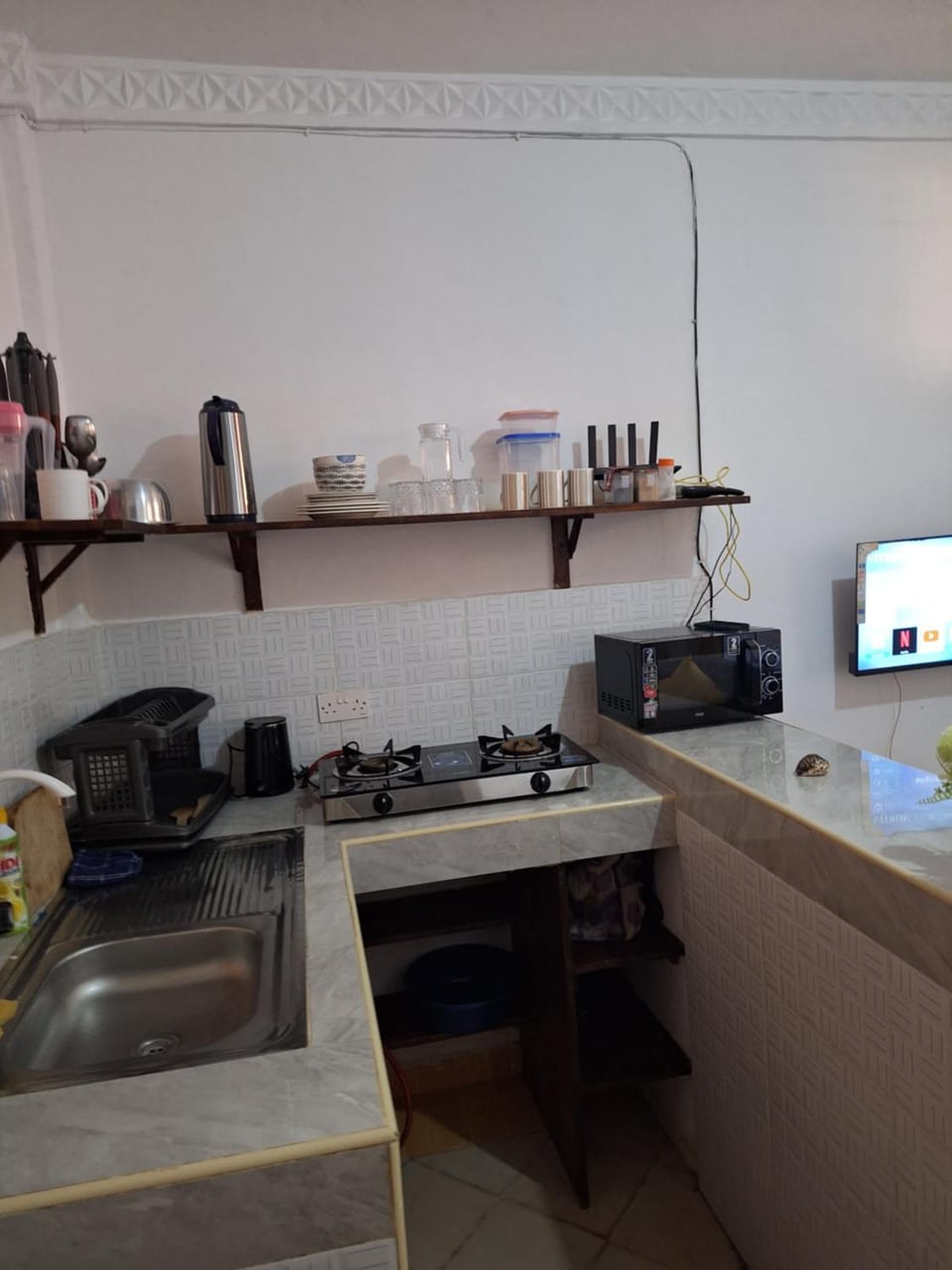 Kitchen or kitchenette, stove