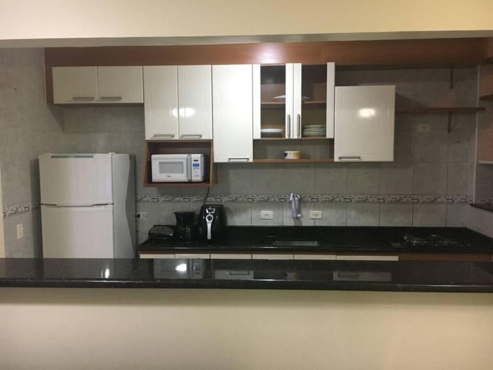 Maravilhoso Apartamento Pé na areia em Praia Grande Apartment in Sao Paulo City
