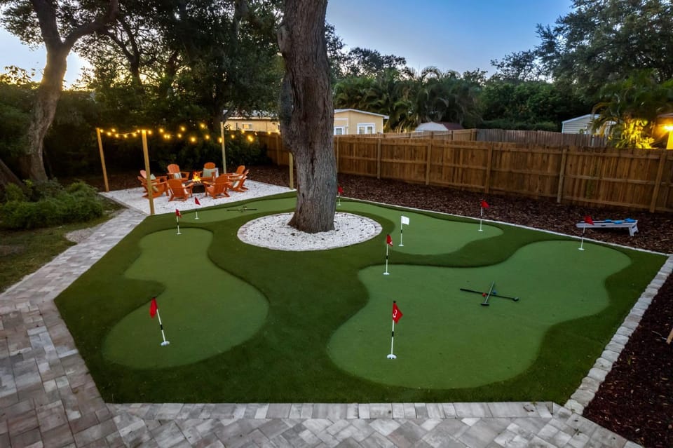 Resort-Style Oasis Pool Mini Golf Playground House in Largo