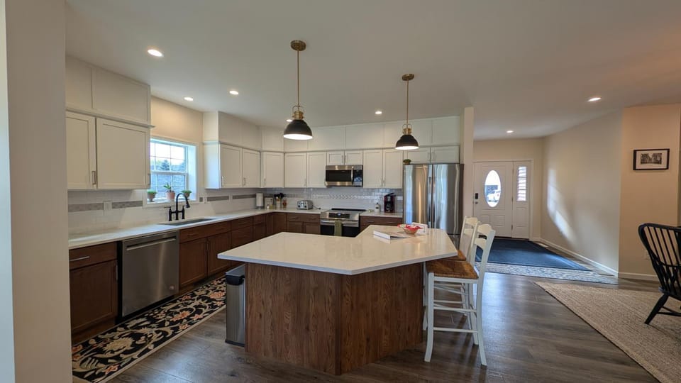 Kitchen or kitchenette, dishwasher, microwave, oven, stove, toaster, kitchen