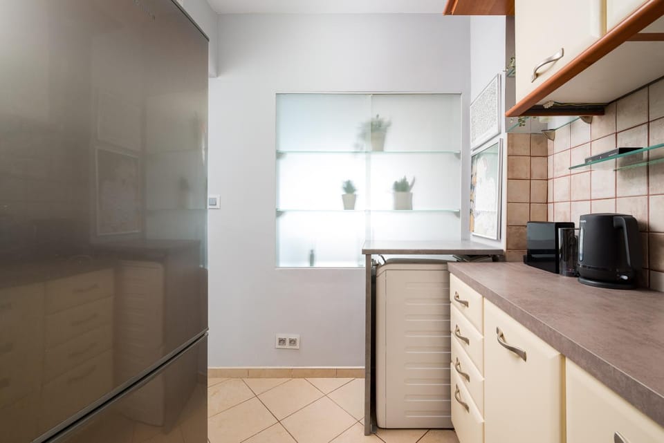 Kitchen or kitchenette, oven, stove