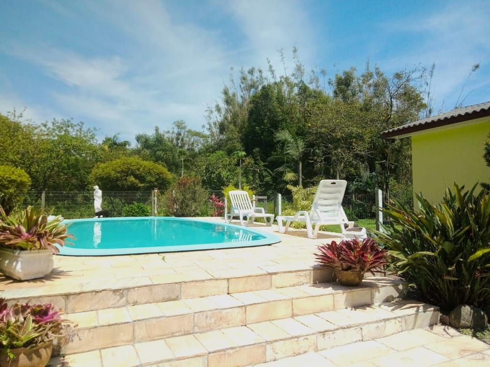 Swimming pool, sunbed