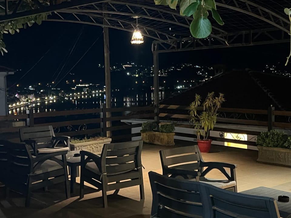 Patio, Night, View (from property/room), Living room, Seating area, Dining area