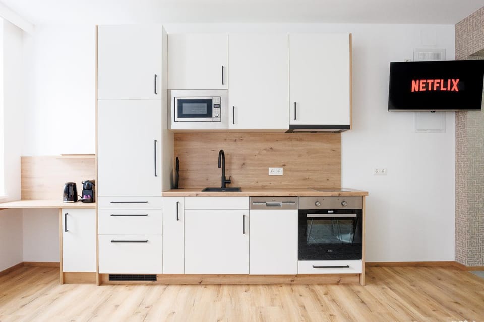 Kitchen or kitchenette, oven, stove