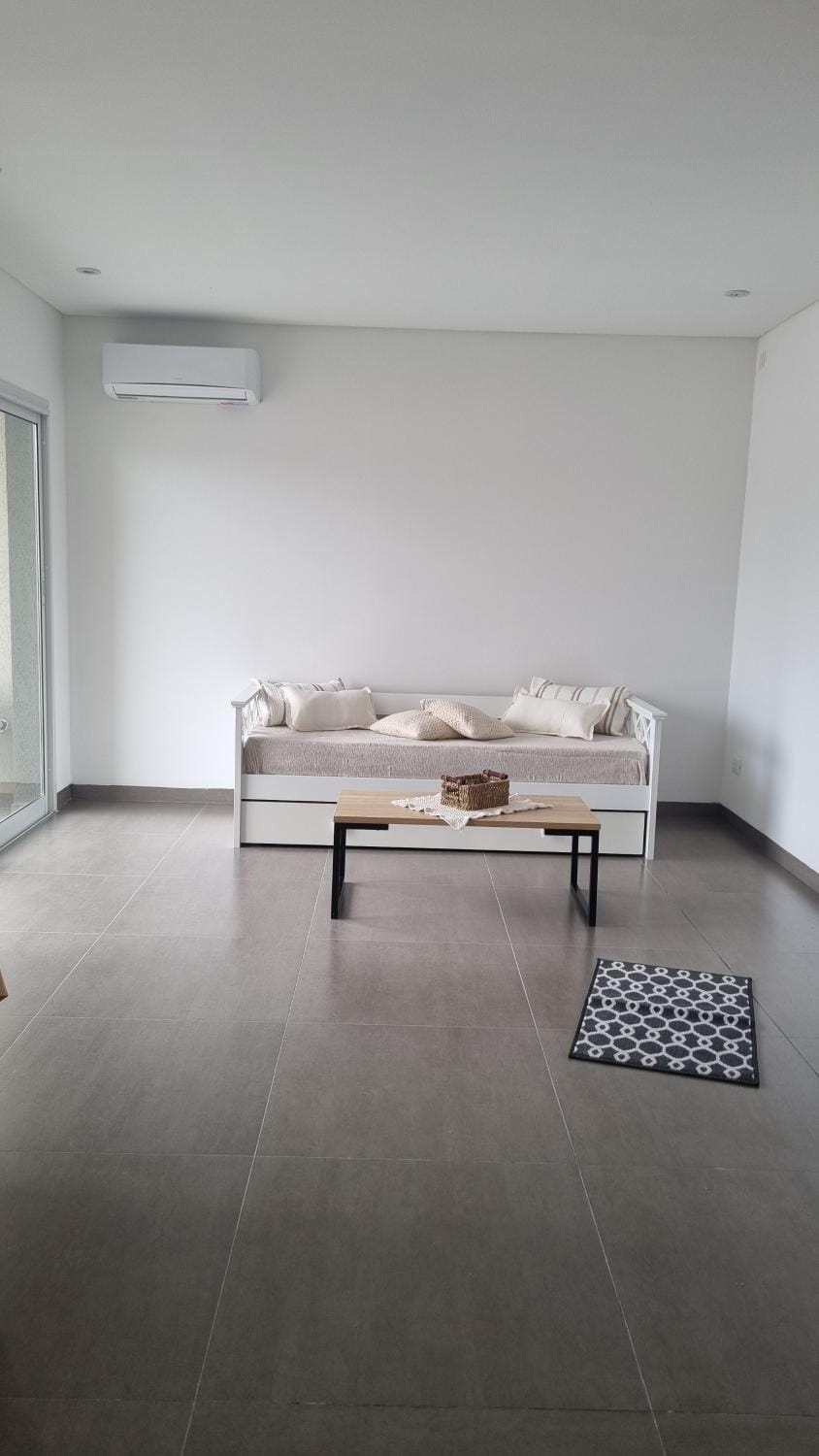 Bed, Living room, Seating area