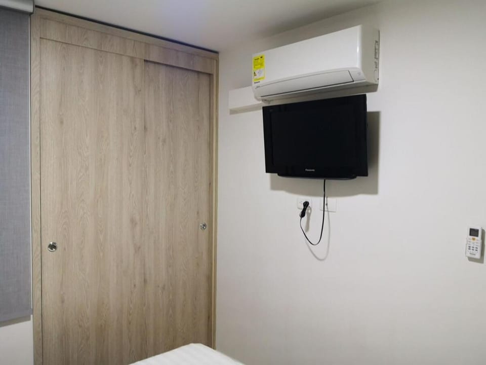 Bed, wardrobe, air conditioner