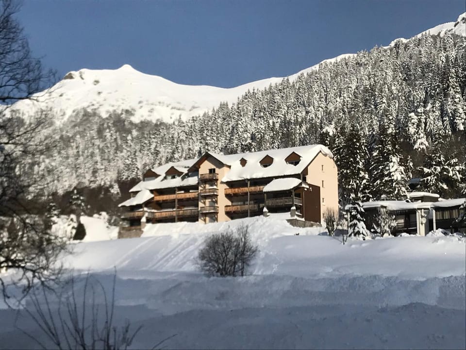Property building, Nearby landmark, Natural landscape, Mountain view