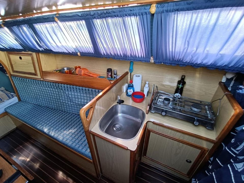 Portuguese Sailboat Experience I Docked boat in Lisbon