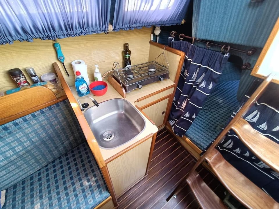 Portuguese Sailboat Experience I Docked boat in Lisbon