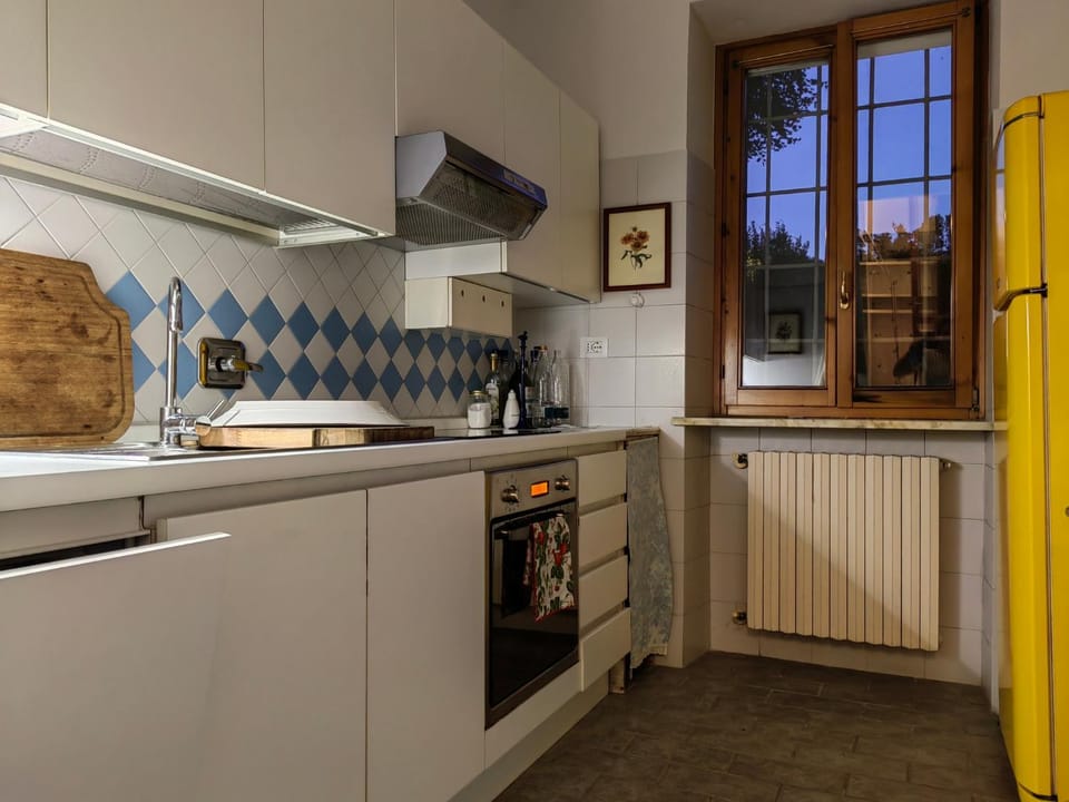 Kitchen or kitchenette, dishwasher, oven, stove