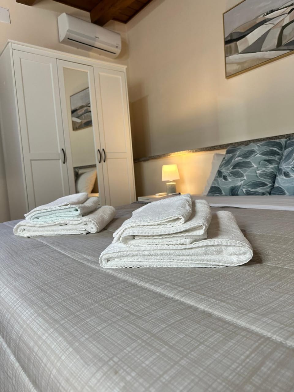 Bed, Bedroom, towels, wardrobe, air conditioner