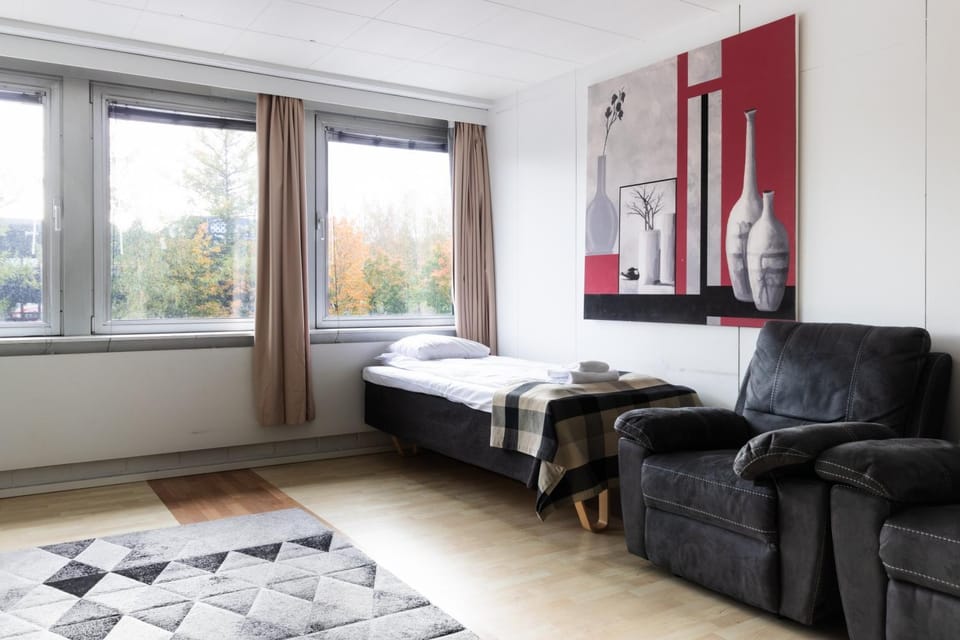 Bed, Living room, Seating area