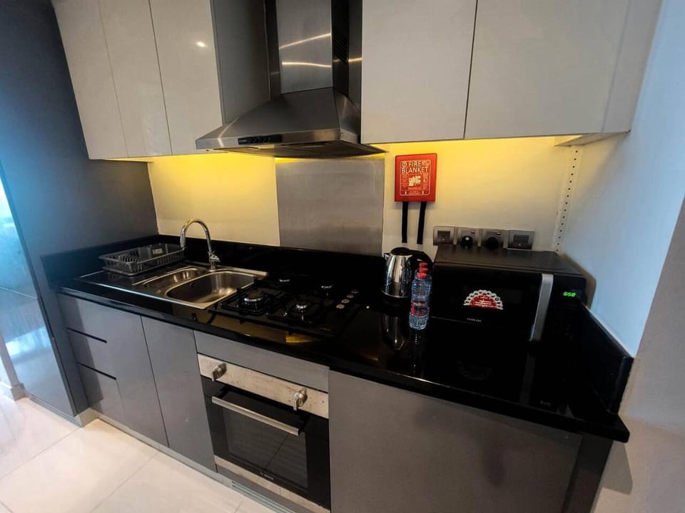 Kitchen or kitchenette, stove