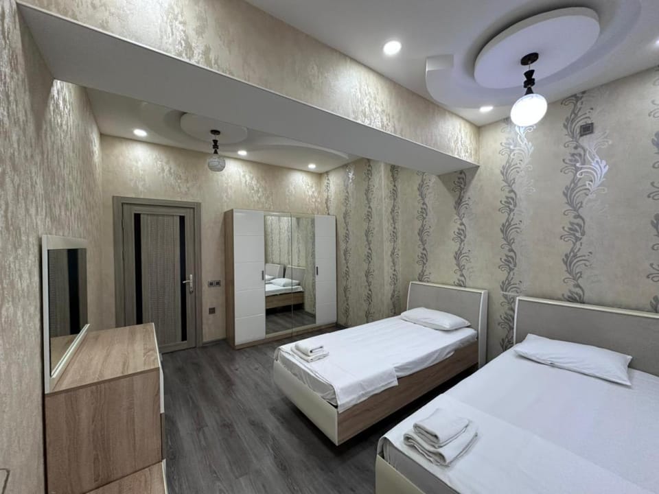 Bed, TV and multimedia, Bedroom, towels, wardrobe