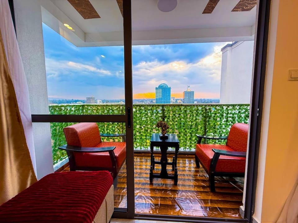 Natural landscape, View (from property/room), Balcony/Terrace, Living room, Seating area, Dining area, Sea view