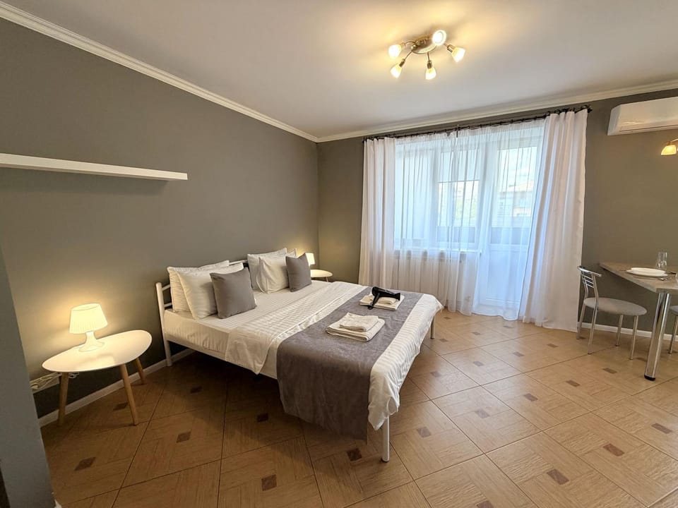 Bed, Balcony/Terrace, Balcony/Terrace, Photo of the whole room, Bedroom, towels, air conditioner, air conditioner