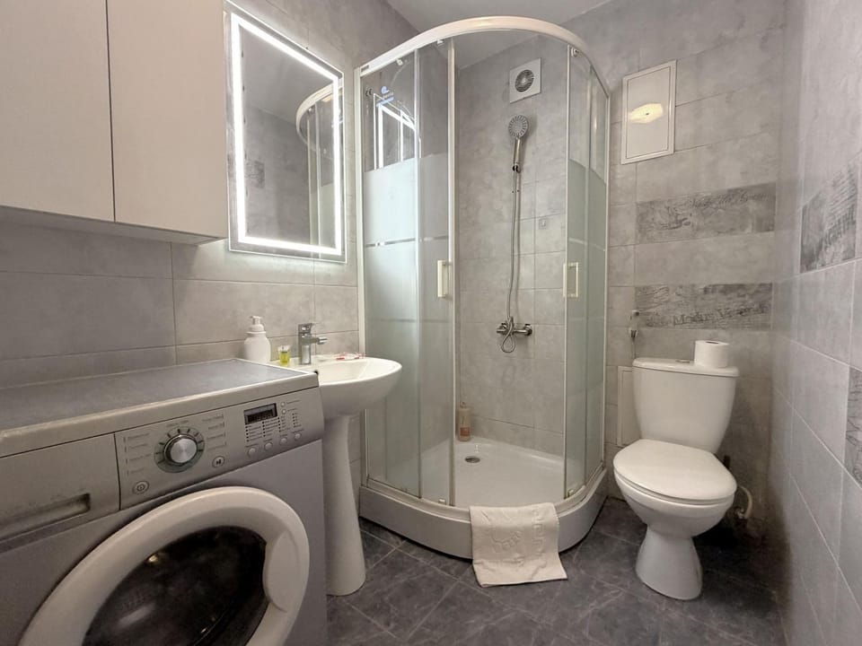 Shower, Toilet, Bathroom, Bath, bidet, towels, washing machine, washing machine, dryer