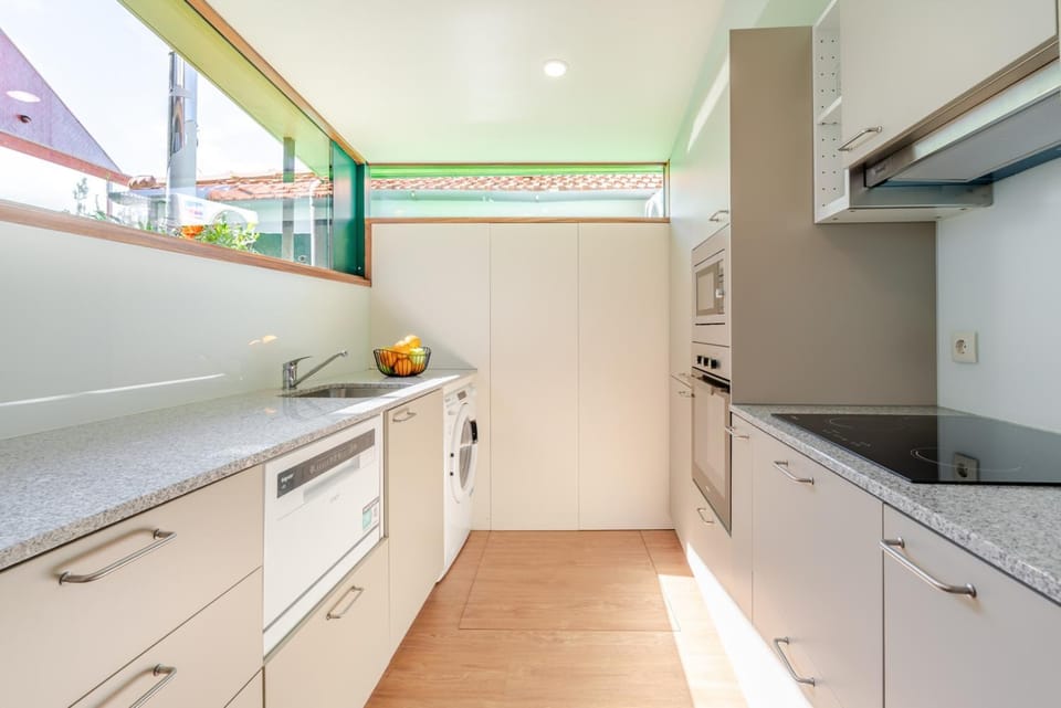 Kitchen or kitchenette, dishwasher, oven, pet friendly, stove, washing machine, dryer