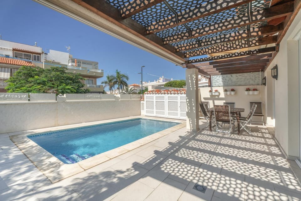 Property building, Living room, Swimming pool