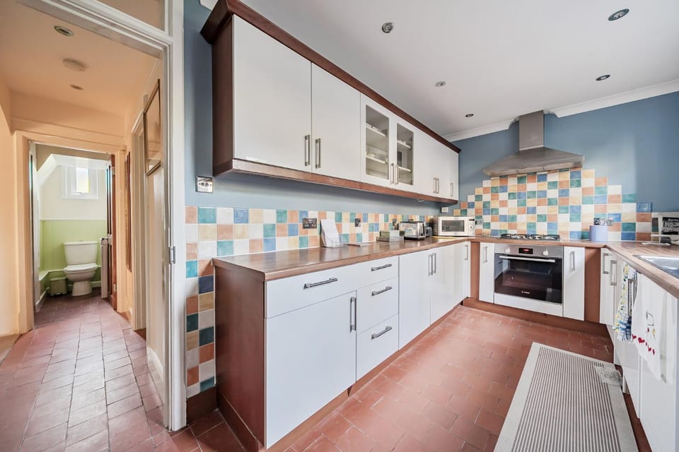 microwave, oven, storage, stove, toaster, kitchen