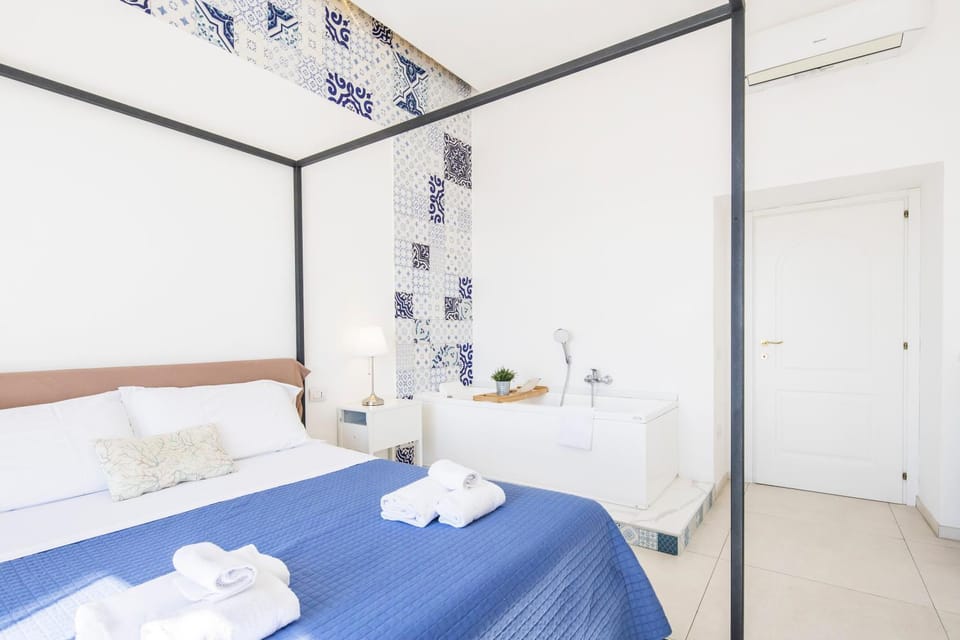 Bed, Photo of the whole room, Bedroom, towels, air conditioner