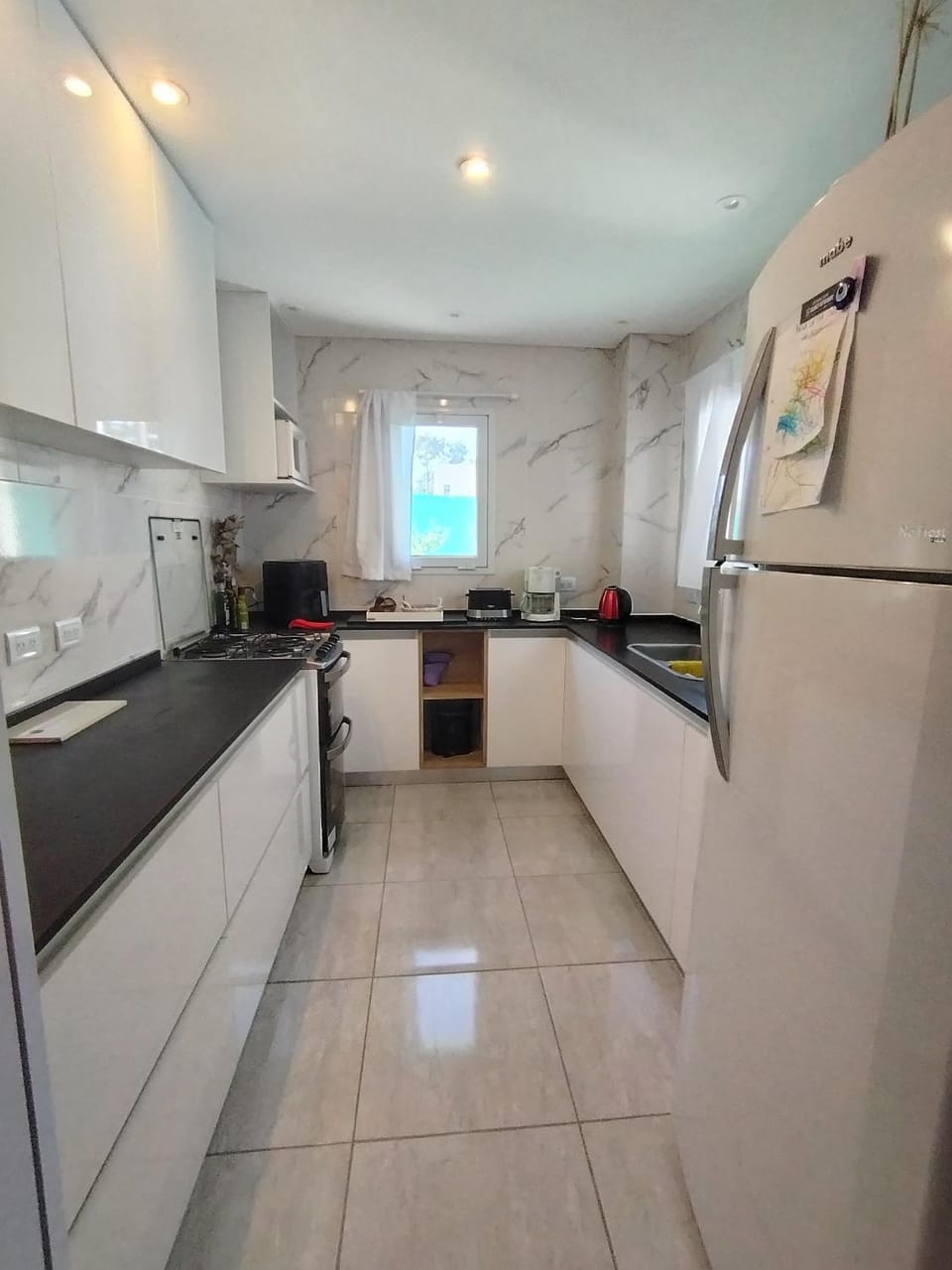 Kitchen or kitchenette, oven
