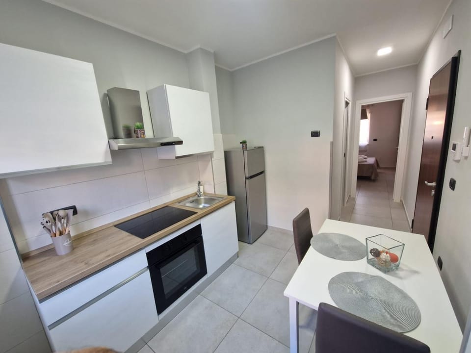 Kitchen or kitchenette, Living room, stove