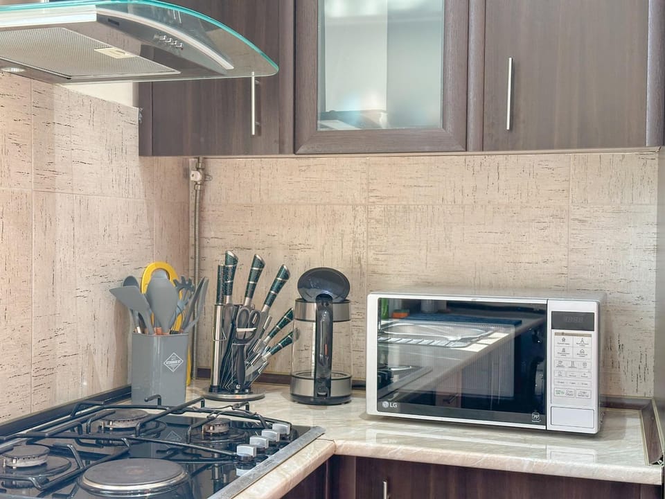 Kitchen or kitchenette, stove