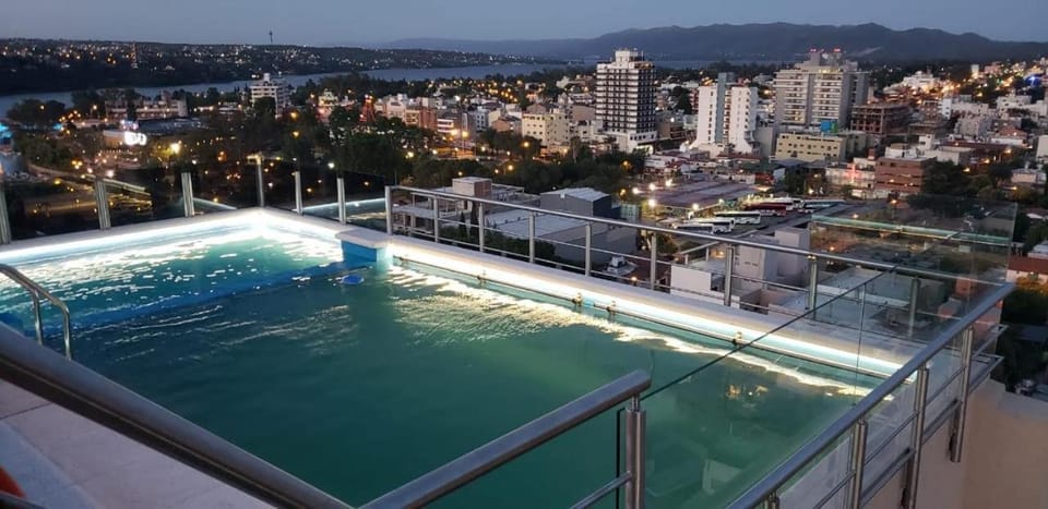 Property building, Night, Natural landscape, City view, Pool view, Swimming pool