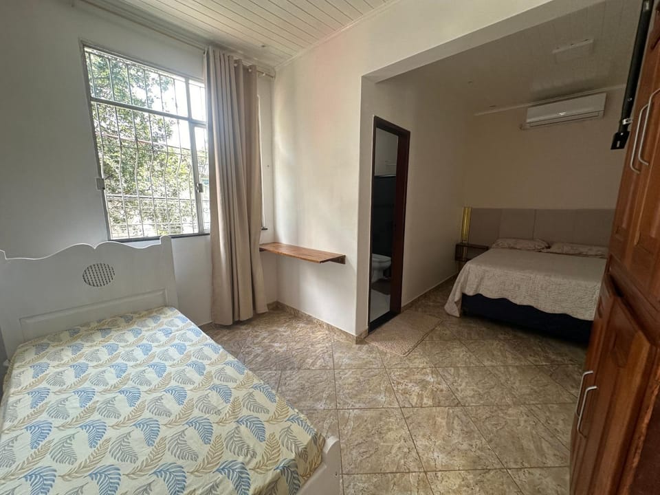 Suíte espaçosa com ar-condicionado no coração de Belém próximo ao Mangueirão Vacation rental in Belém