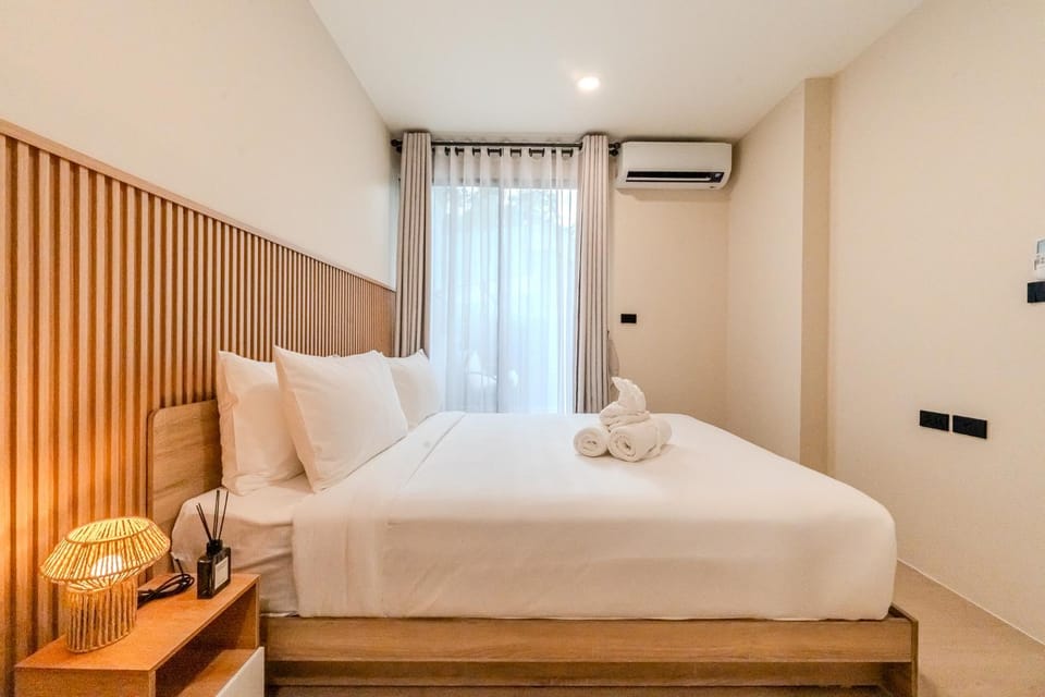 Bed, Photo of the whole room, Bedroom, towels, air conditioner