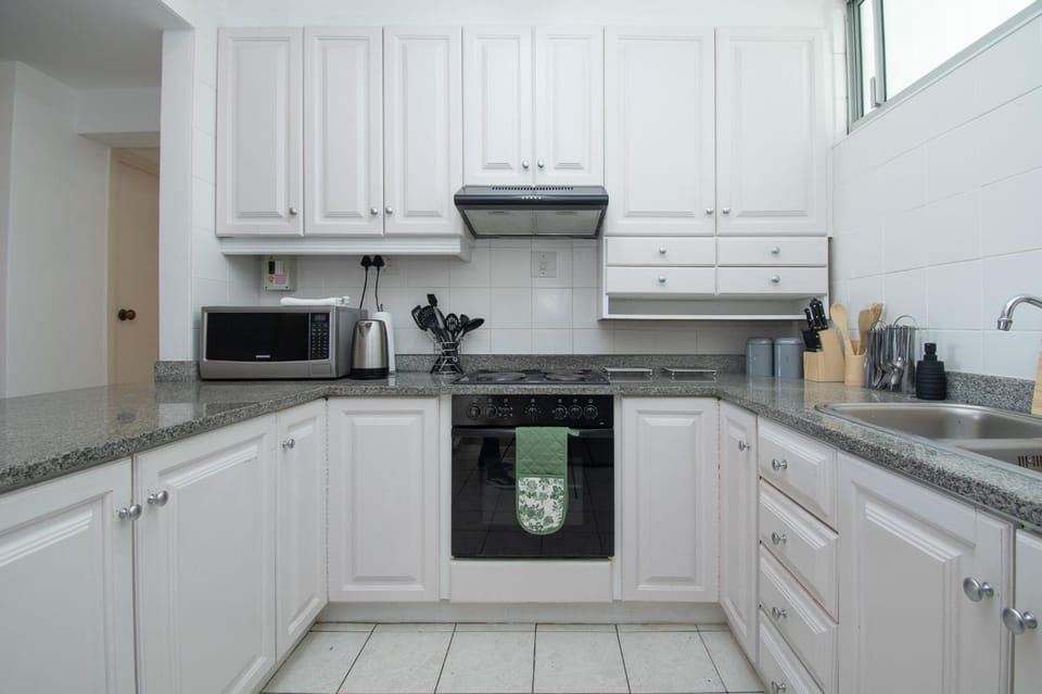 Kitchen or kitchenette, oven, stove