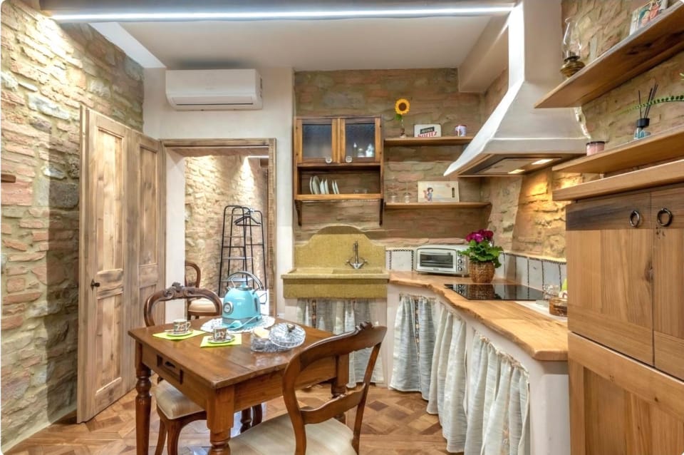 Kitchen or kitchenette, Dining area, stove, air conditioner