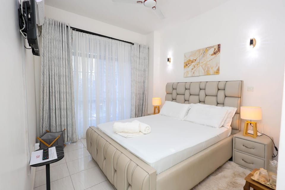 Bed, TV and multimedia, Bedroom, Entertainment, bunk bed, bidet, hair dresser, hair dryier, wardrobe, wedding, air conditioner, air conditioner