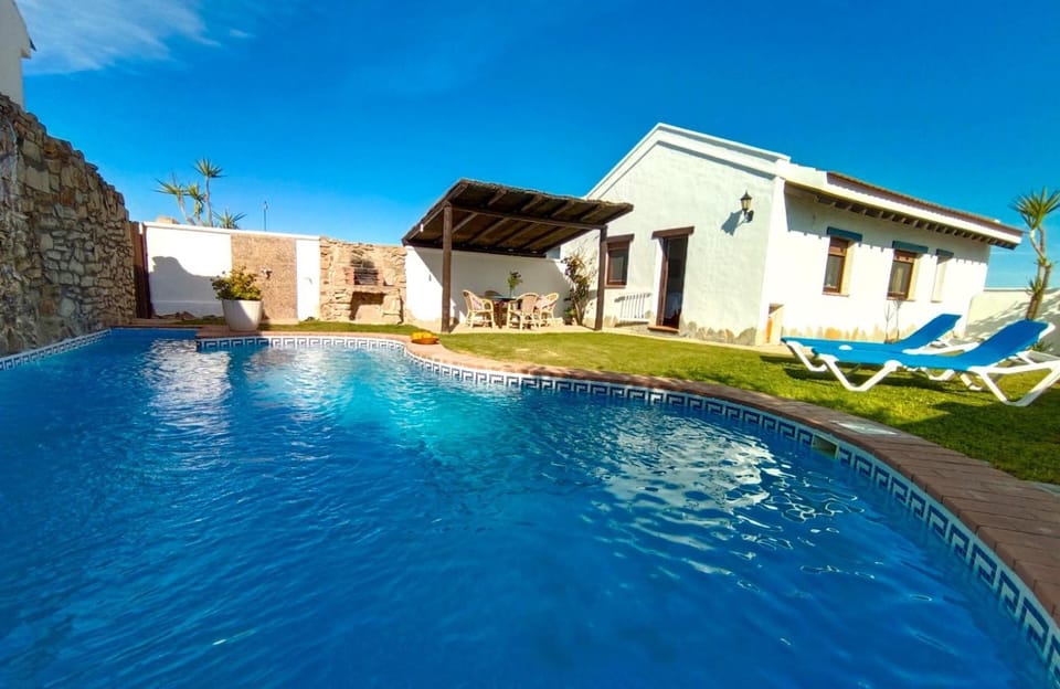 Property building, Living room, Swimming pool