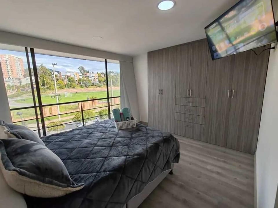 Apartamento moderno frente a la Universidad Santo Tomás WiFi y parqueadero Apartment in Tunja