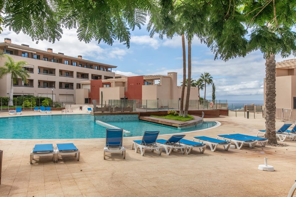 Property building, Living room, Swimming pool