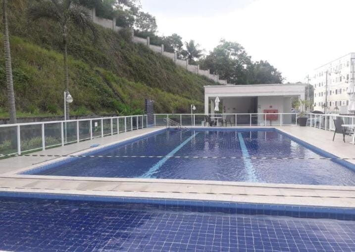 Apartamento completo em condomínio com piscina próximo a praia Apartment in Lauro de Freitas