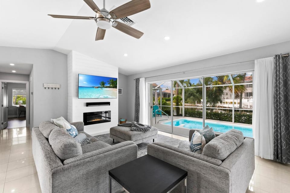Living room, Seating area, Pool view, fireplace